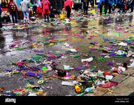 mardi-gras-beads-and-throws-on-st-charles-avenue-after-parade-in-new-S1432D.jpg
