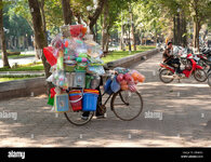 bicycle-loaded-with-goods-in-street-in-saigon-CBND9A.jpg