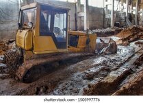 stuck-mud-broken-tracked-bulldozer-260nw-1505997776.jpg