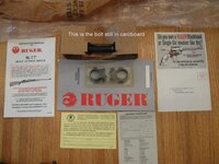 Ruger M 77 VGM 243  bolt papers & rings.jpg