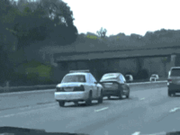 cop-trolls-slow-driver-in-left-lane-on-highway.gif