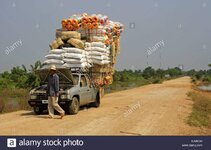 overloaded-pick-up-truck-cambodia-A2M5CH.jpg