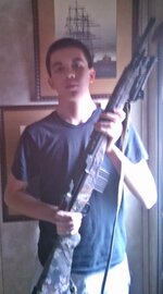 boy%20and%20his%20rifle_zpsqmxxefy3.jpg