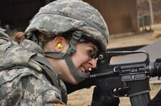 nd_Infantry_Division,_looks_down_her_sight_on_the_M16A2_rifle_as_she_waits_to_130319-A-WG463-056.jpg