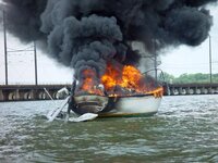 182658428-burning-boat.jpg