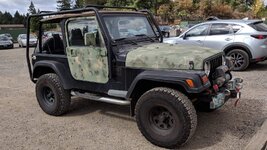 Jeep with Top No Sides Doors on.jpg