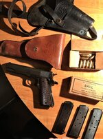 1943 Ithaca 1911A1 with clips, holsters, ammo.jpg
