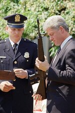 Bill-Clinton-holds-a-Colt-004.jpg