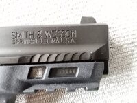 gun manuf embossed partial serial shown.jpg