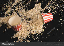 depositphotos_171601508-stock-photo-popcorn-spilled-of-cardboard-buckets.jpg