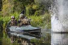 2-special-forces-men-paddling-army-kayak-oleg-zabielin.jpg
