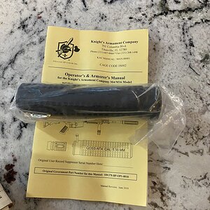 Suppressor with manual.jpg