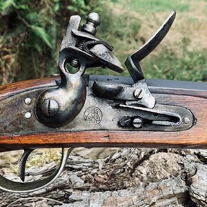 Close up of the flintlock of the Fowler.